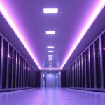 High-performance computing data center with advanced servers, glossy surfaces, soft LED lighting, and a cool, tech-focused atmosphere..